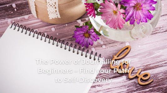 An image of a wirobound journal with pink and purple flowers
